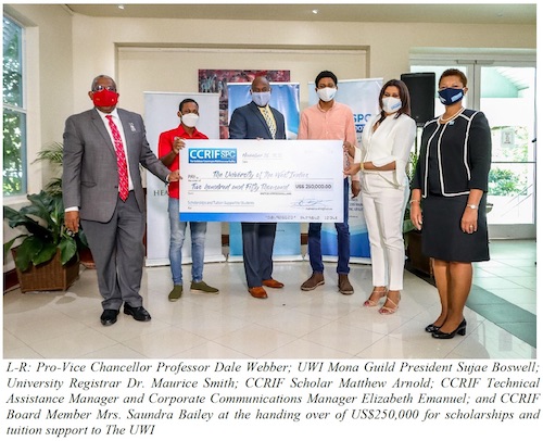 CCRIF SPC handing over of US$250,000 for scholarships and tuition support to The UWI